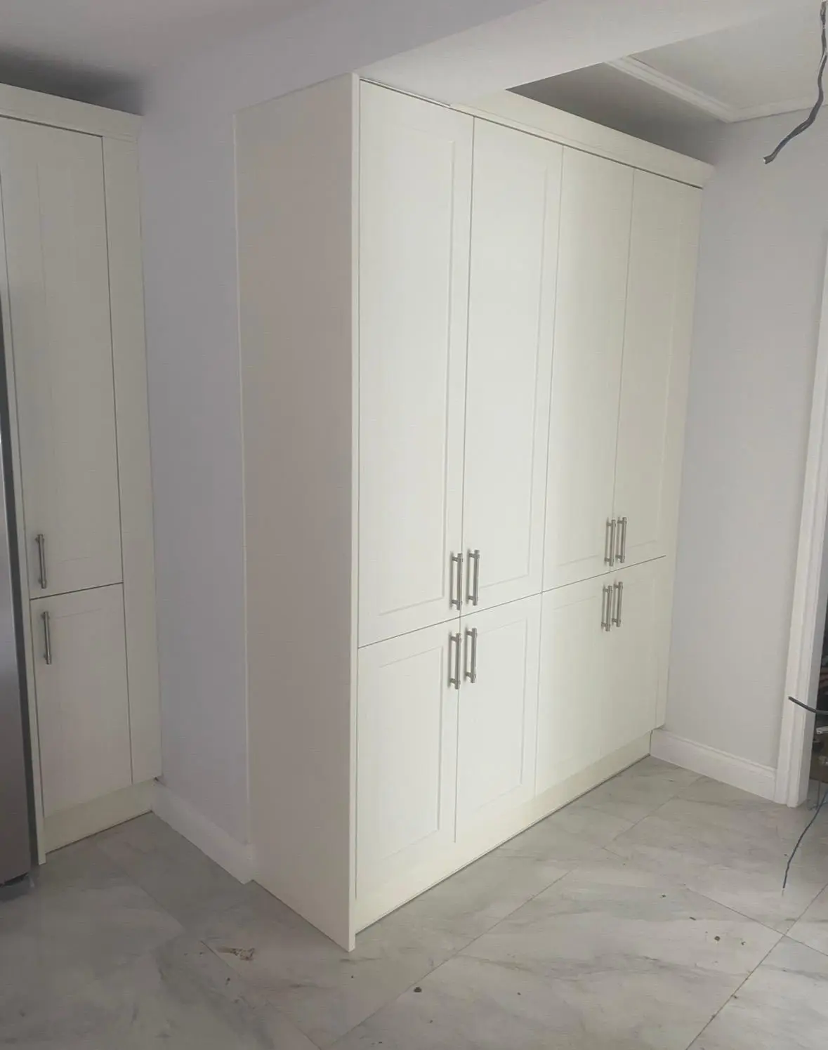 Cream shaker tall larder units
