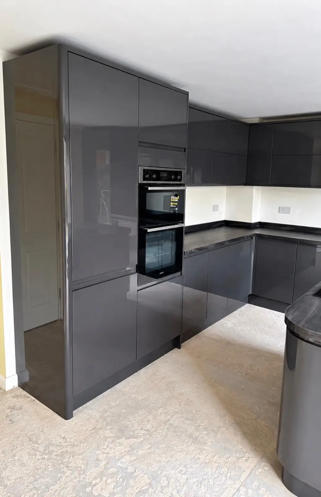 Graphite gloss tall housings with a built-in double oven