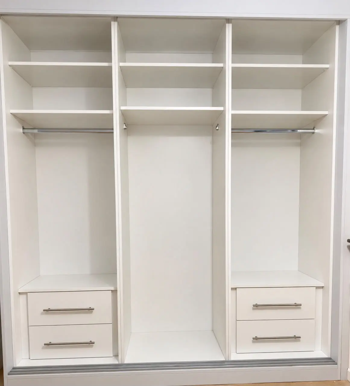 Inside the sliding wardrobe: hanging rails, shelves and drawers