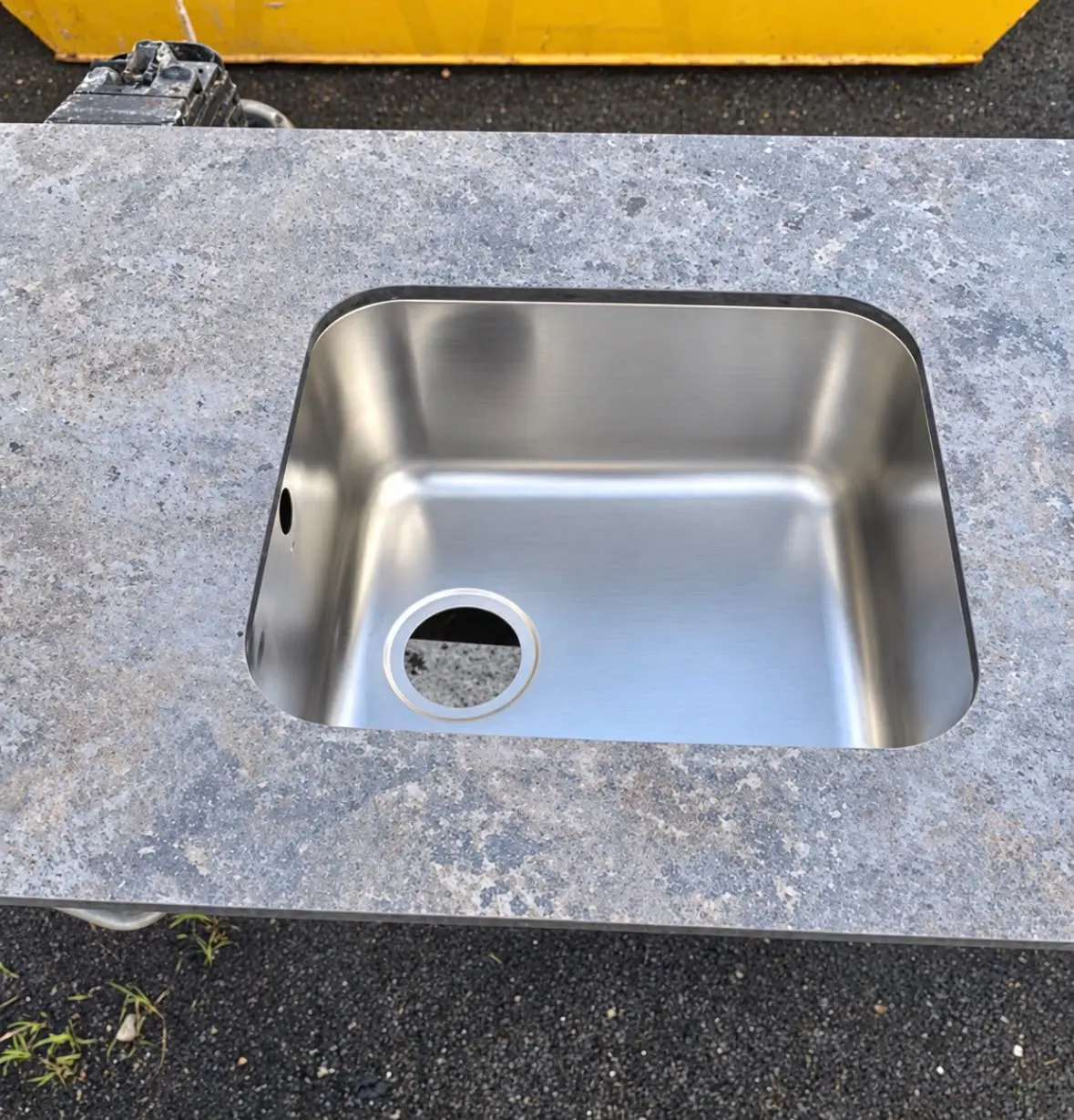 Undermount sink positioned under the new cut-out